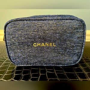 Authentic Chanel navy blue denim holiday pouch 
Excellent Condition